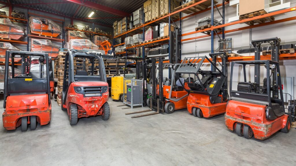 55130,Forklift machinery in a row in warehouse